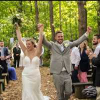 <p>Ashley and Kyle Tress at their Folklore-themed wedding.</p>