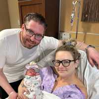 <p>Baby Eleanor and her parents Alyssa Roy and dad Andy Steen of Jersey City. They did not know the gender, and the gender was a total surprise.&nbsp;
  
</p>