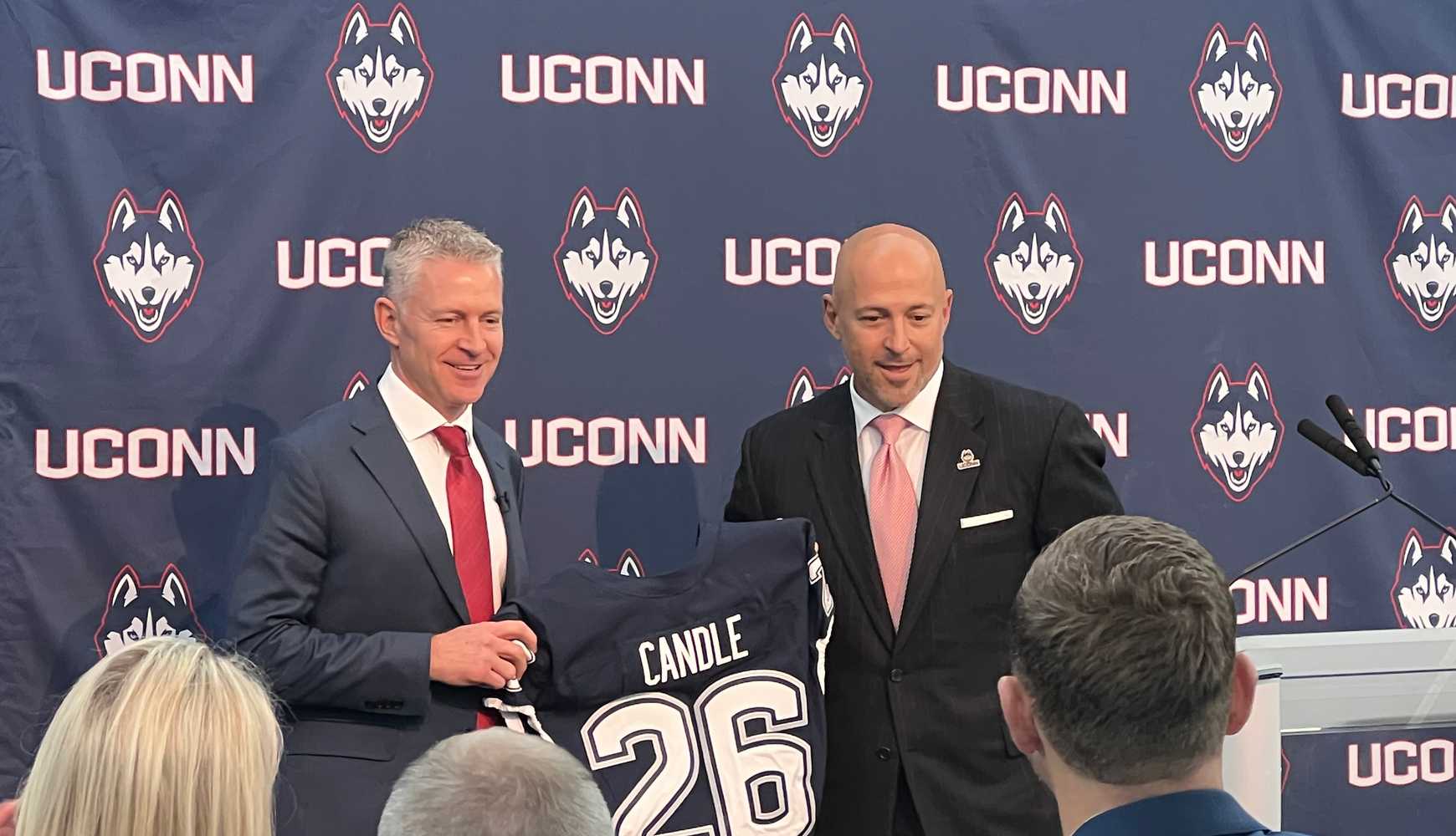 
UConn athletic director David Benedict and head football coach Jason Candle at Candle's introductory news conference on December 8, 2025.
  

