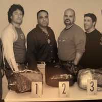 <p>Detective Sgt. Robert, VonSchalscha, Chief Robert Guidetti, Deputy Chief Frank Scott, and Detective Sgt. Kurt Massey with 90 pounds of marijuana in the 2007 California investigation.</p>