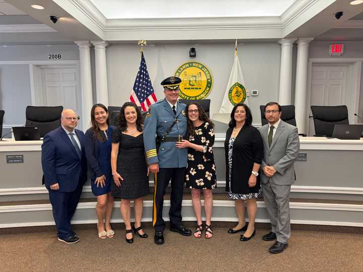 Chief Dawicki with Mayor Cutrone, Deputy Mayors Reinitz and Rottenstrich, Councilmembers Salinas and Krause, and his wife Deanna Dawicki.
  
