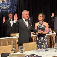 <p>Rutherford Police Chief John Russo is sworn in as the New Jersey State Association of Chiefs of Police's 109th president, with wife Cindy.</p>