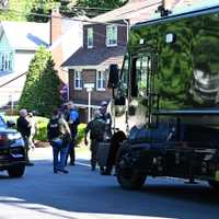 <p>The May 22 U.S. Marshals fugitive seizure brought a SWAT team and other area law enforcement to Maywood.</p>