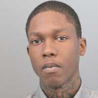 Wanted NJ Burglar, 21, Caught In NY With Illegal Gun, USPS Jacket, Credit Card Scanner: Police