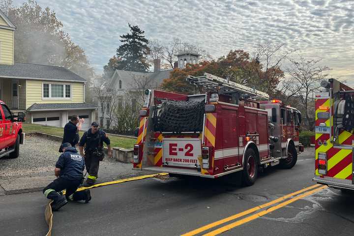 Norwalk Firefighters Smash Through Wall To Save Person Trapped In Burning Car Inside Garage