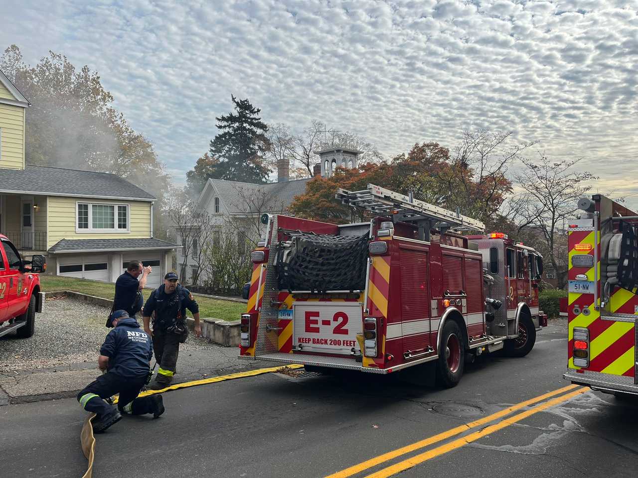 Norwalk firefighters closed a portion of Fairfield Avenue after a car caught fire inside a home's garage on Wednesday, Nov. 5. Norwalk firefighters closed a portion of Fairfield Avenue after a car caught fire inside a home's garage on Wednesday, Nov. 5. 