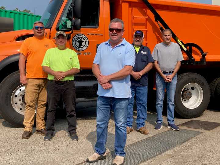 Members of the New Canaan Highway Department, from left: Lou Boice, Jim Peck, Superintendent Mose Saccary, Dan Tiani, and Dan Bochicchio.
  
