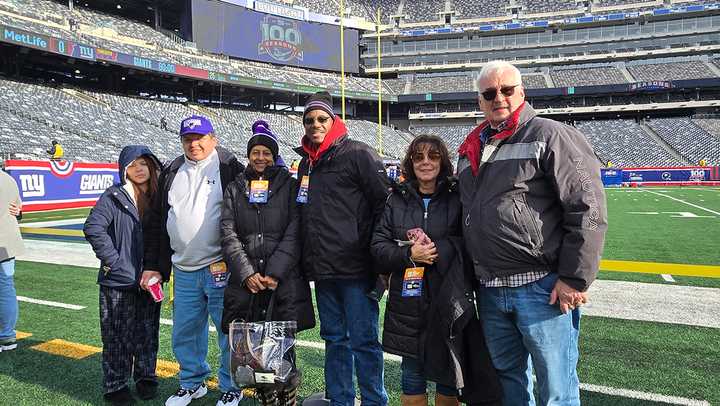 Lottery winners and guests watched pre-game warm-ups from the sideline. From left to right: Melanie Garcia, Juan Garcia, Darlene Brown, Lenny Brown, Debbie Jones and Raymond Jones.