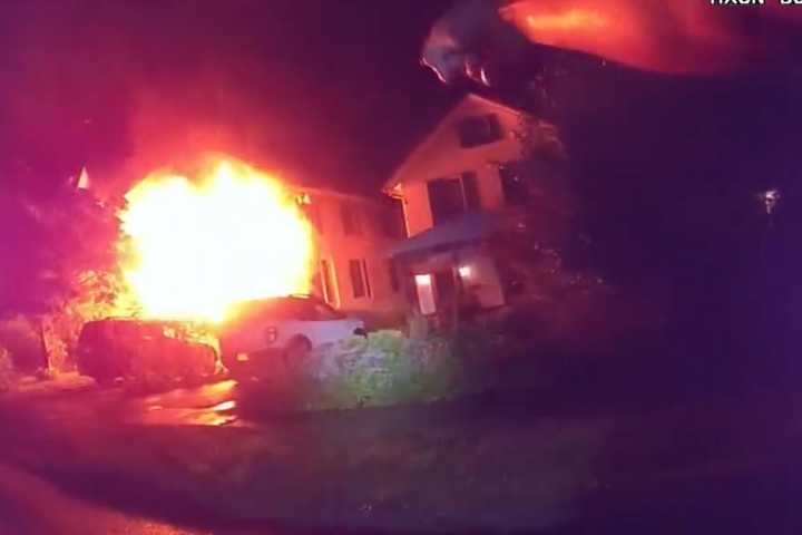 Dramatic Video Shows Officers Rescuing Residents From Burning Westchester Home