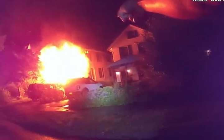 Members of the Ossining Police Department saved residents trapped in the rear of this burning home in the area of Maurice Avenue.&nbsp;