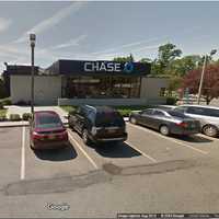 Woman Wearing Surgical Mask At Large After Bank Robbery In Selden