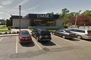 Woman Wearing Surgical Mask At Large After Bank Robbery At Long Island Chase Branch