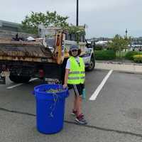 <p>Jahnan Rahimpour volunteers at the Edgewater Marina.</p>