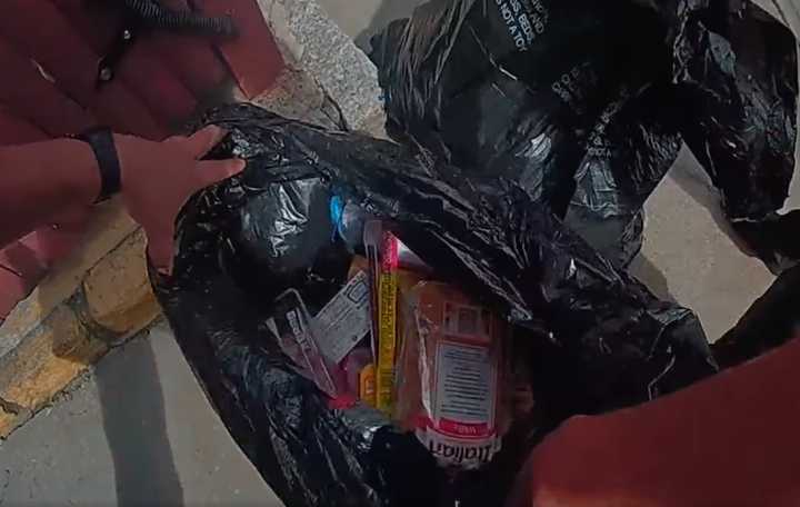 The stolen items were found in garbage bags, police said.