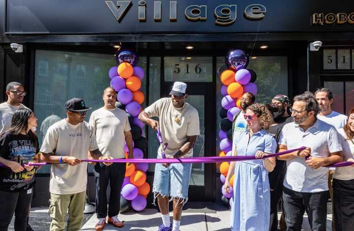 Al Harrington cuts the ribbon on his new Hoboken cannabis shop.