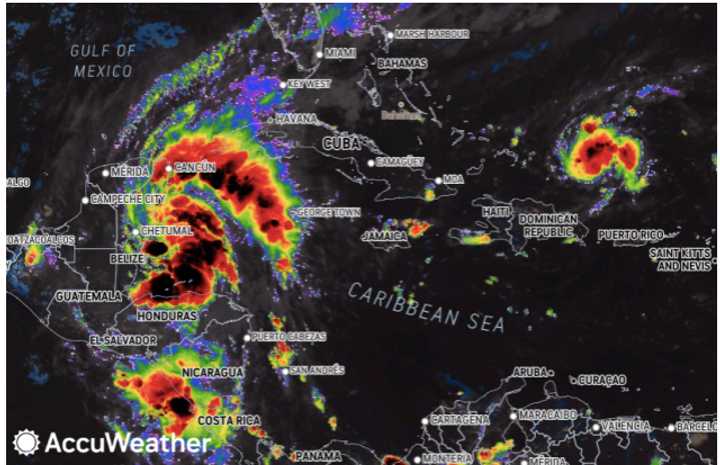 An enhanced satellite image by AccuWeather on Saturday morning, Oct. 19, shows Nadine (far left) around the time it became a tropical storm.