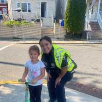 <p>Quinton daughter Harper with Cabrera, whom she calls "Doctor Police Officer."</p>