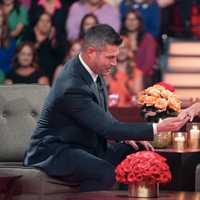 <p>Joan Vassos and new fiance Chock talk to Jesse Palmer on "After the Final Rose."</p>