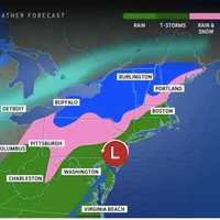 <p>A look at precipitation types predicted by location: heavy rain and thunderstorms (dark green), rain (green), a mix of rain and snow (pink), and snow (blue).
  
</p>