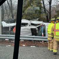 Car Flips Over Guardrail, Scatters Debris Across Route 287