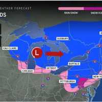 <p>A mix of rain and snow is expected in the areas shown in pink, with snow predicted for locations in blue on Christmas Eve Day.</p>