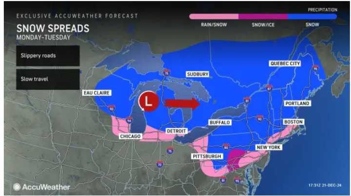 A mix of rain and snow is expected in the areas shown in pink, with snow predicted for locations in blue on Christmas Eve Day.