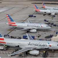 Passengers Evacuate Onto Wing After Fire Erupts On American Airlines Plane In Denver