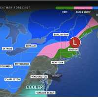 <p>A look at the widespread rainfall on New Year's Eve, Tuesday, Dec. 31, into New Year's Day morning on Wednesday, Jan. 1, with a wintry mix (in pink) inland and snow farthest north.</p>