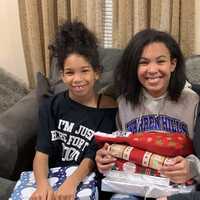 <p>Laura Hughes with her daughters, Jase and Iridessa.
  
</p>