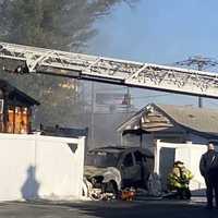 Vehicle Fire Spreads To Home In Rochelle Park (PHOTOS)