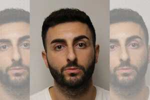 'You're Dead:' Tesla Driver Who Hit Minivan With Baseball Bat Surrenders, Paramus PD Says