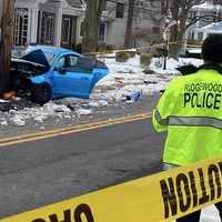 <p>A DUI driver was found lying outside of his vehicle after crashing into a pole in Ridgewood, police said.</p>