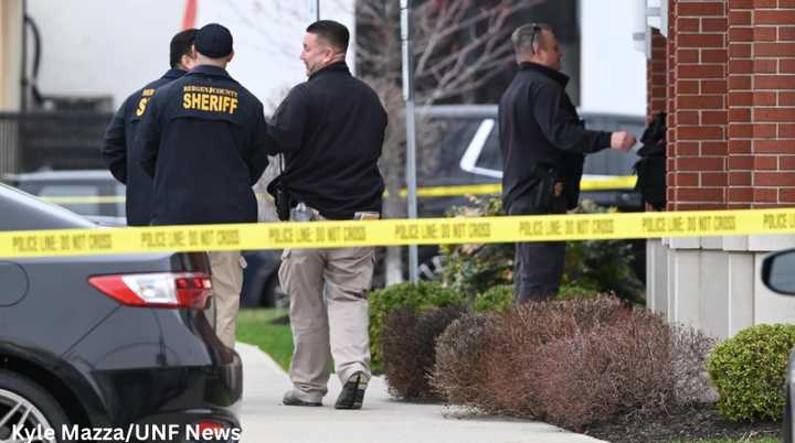 Investigators at the scene of a bank robbery (file photo).