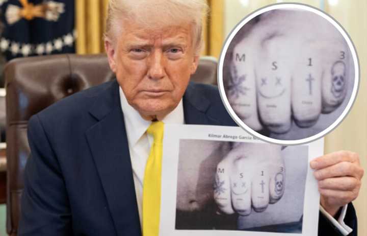 President Trump holds up a photo he claims is definitive proof of Kilmar Abrego Garcia’s gang ties: his tattoos, including both symbols and lettering.