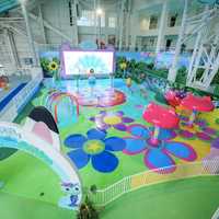 North America’s Largest Indoor Splash Pad Opens At NJ Mall With Boozy Perks For Grown-Ups Too