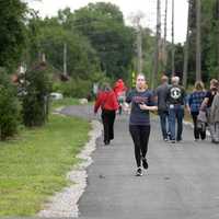 <p>Walkers and runners on the Pompton Valley Rail Trail.</p>
