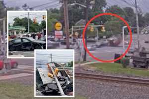 Stunning Train Cam Footage Shows Malfunctioning Truck Barrel Through Bergenfield Intersection