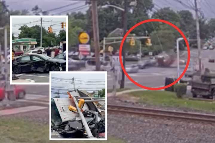 Stunning Train Cam Footage Shows Malfunctioning Truck Barrel Through Bergenfield Intersection