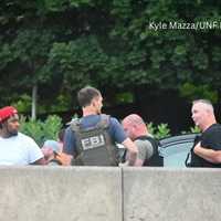 <p>James Hendrickson is arrested federal agents on the Hutchinson River Parkway Monday, July 14.
  
</p>