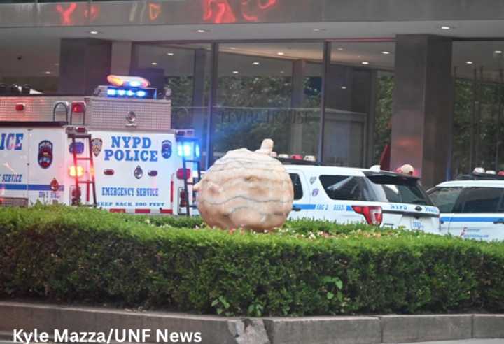 At least three people, including an off-duty NYPD cop, were shot and killed in an incident in at one of midtown Manhattan's prime locations, according to authorities.