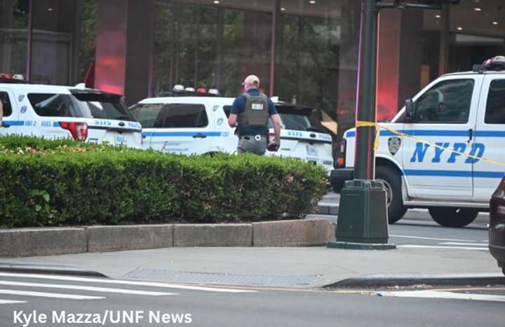 
  Police at the scene in midtown.
