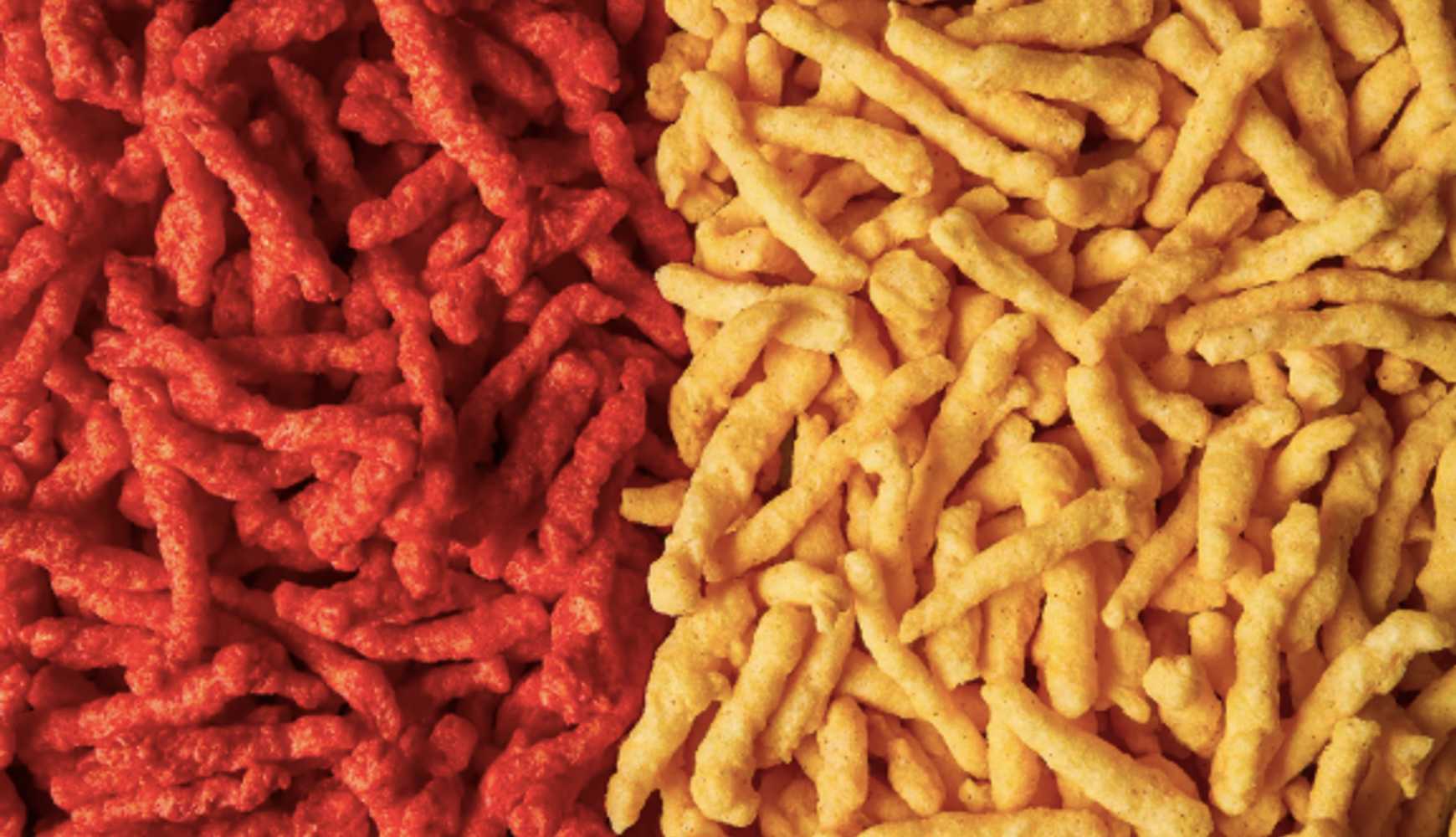 
Cheetos Flamin’ Hot Crunchy next to new Simply NKD Cheetos Flamin’ Hot Crunchy.
