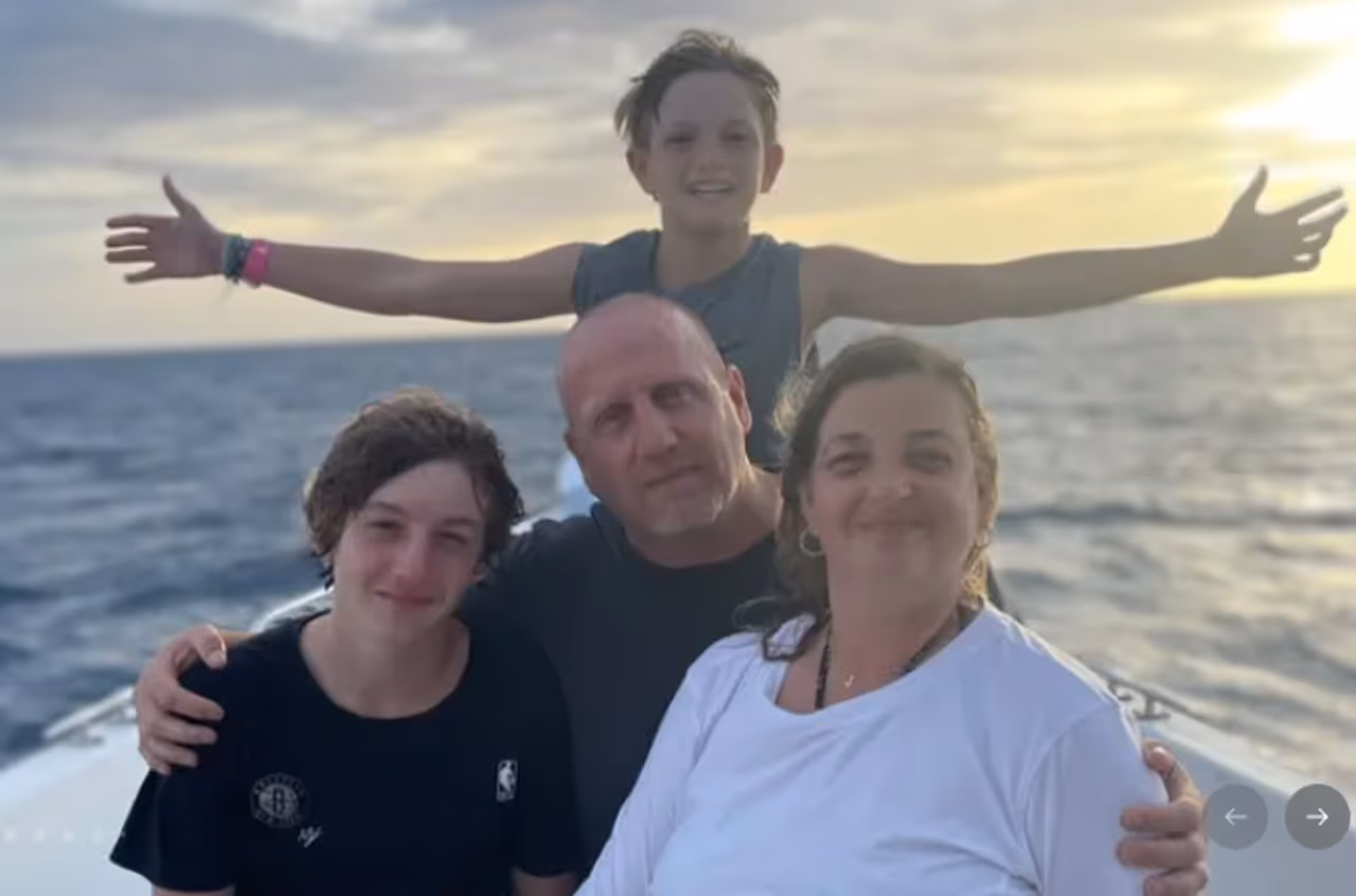 John Auriemma and his wife, Janet, with their two boys.