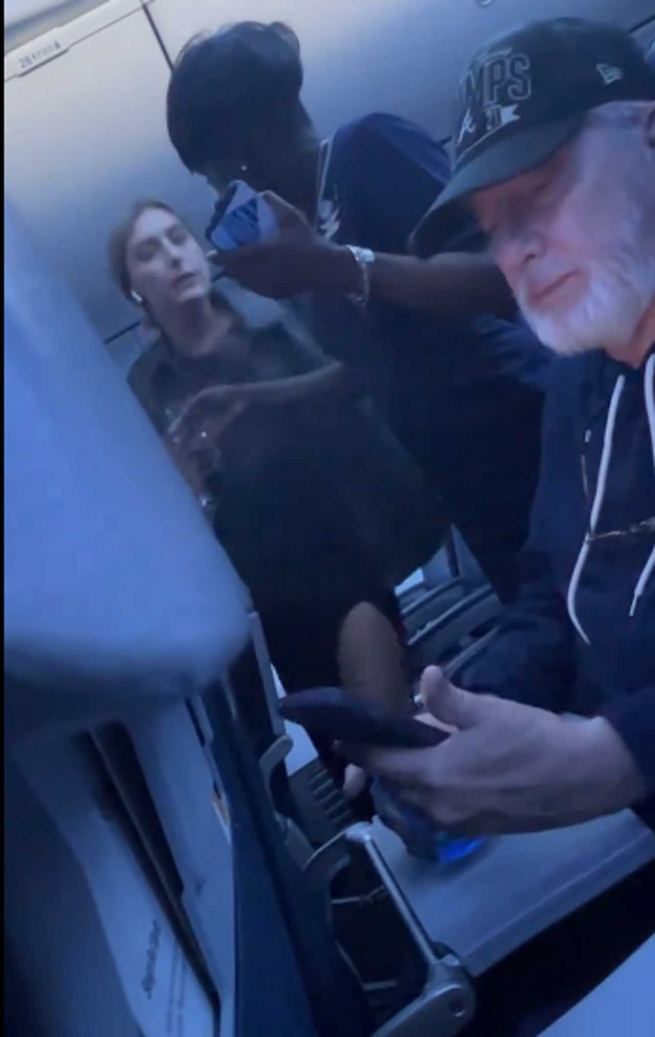 Video of a passenger cursing out flight attendants is going viral.