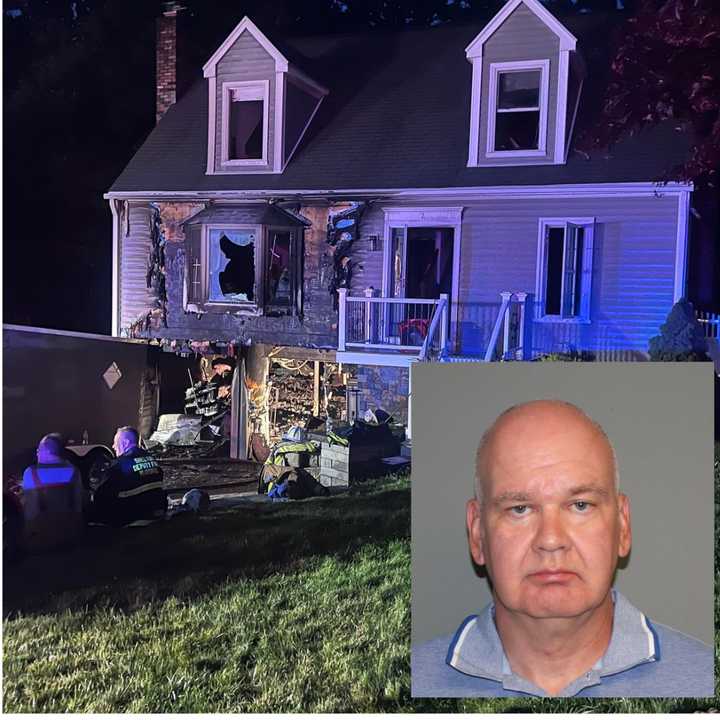 Stephen Lupkas and the burned home.&nbsp;