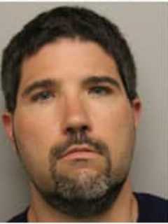 Ex-CT Swim Coach Accused Of Voyeurism