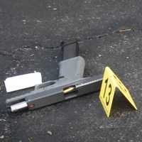 <p>The gun recovered at the crime scene</p>