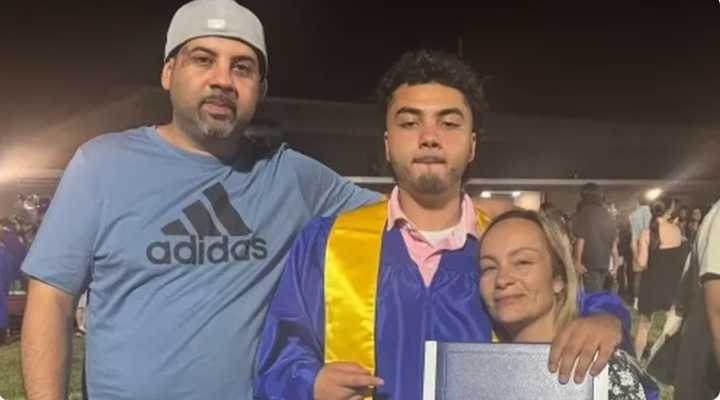 Dante Crespo with is parents at graduation.