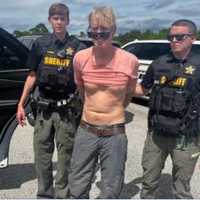 <p>Ryan Wesley Routh is being taken into custody.&nbsp;</p>