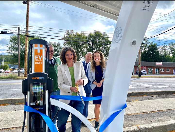 Ulster County Executive Jen Metzger and others at the ribbon cutting on the new charger.&nbsp;